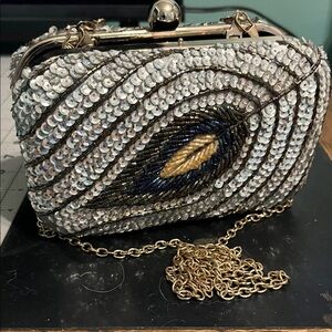 Elegant Sequin Clutch with Gold Chain